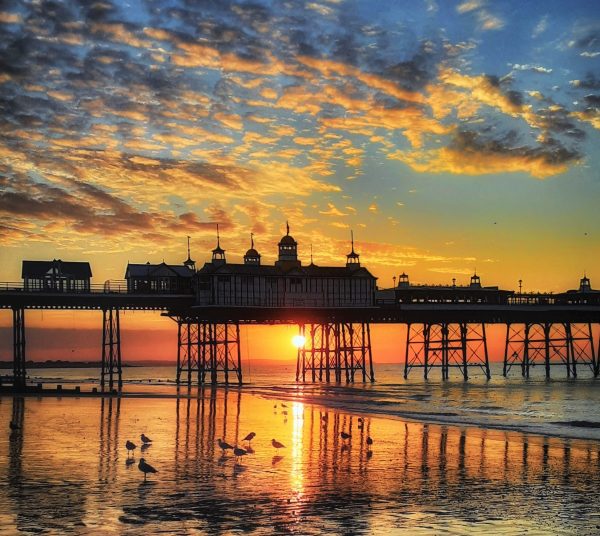 JULY SUNRISE AT PIER LANDSCAPE